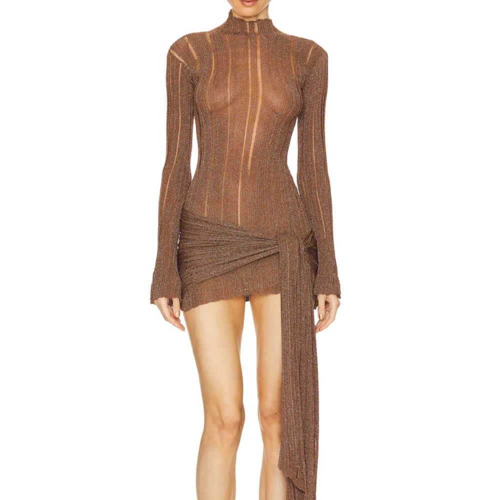 Stunning Aya Muse dress in a semi sheer fabric. With an attached wrap design.